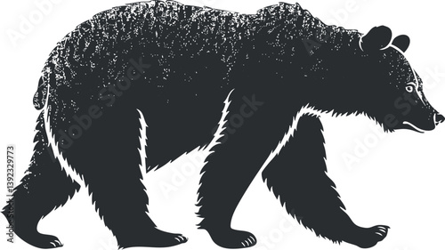 Black silhouette of a walking bear, showcasing its powerful and majestic presence in nature.
