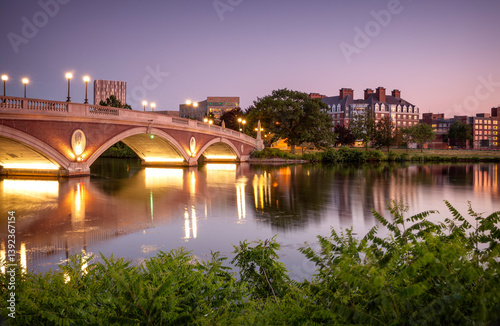 View of the architecture of Cambridge in Massachusetts, USA by the Harvard University with the Charles river and some historic buildings and bridges.