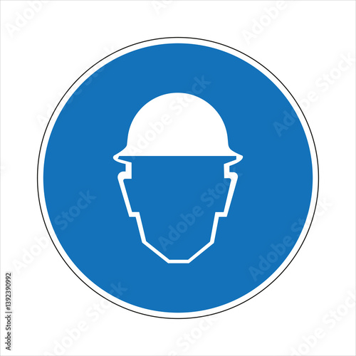 Blue and white mandatory sign indicating the requirement of wearing a hard hat or safety helmet for head protection in construction sites or industrial areas