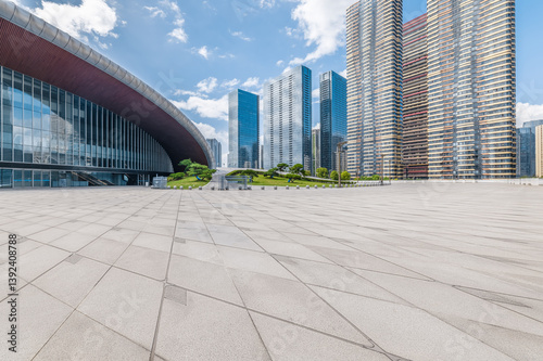 Empty brick floor with modern city buildings background on sunny day.