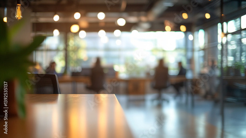 Wallpaper Mural A blurred view of a modern office space with desks and people working in a bright and airy environment Torontodigital.ca
