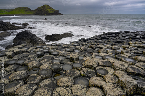 Basalt hexagonal rocks at the Giant's Causeway, UNESCO World Heritage Site, County Antrim, Northern Ireland, UK. June, 2022.(This image may be licensed either as rights managed or royalty free.)