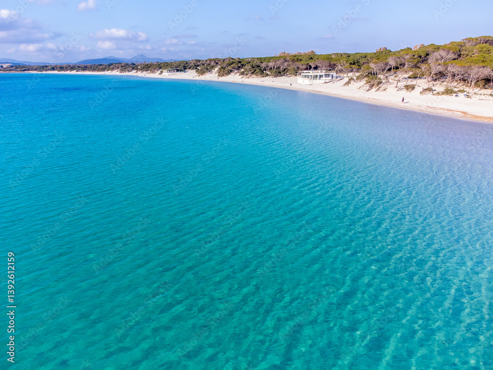 Drone view of Maria Pia beach under a blue sky