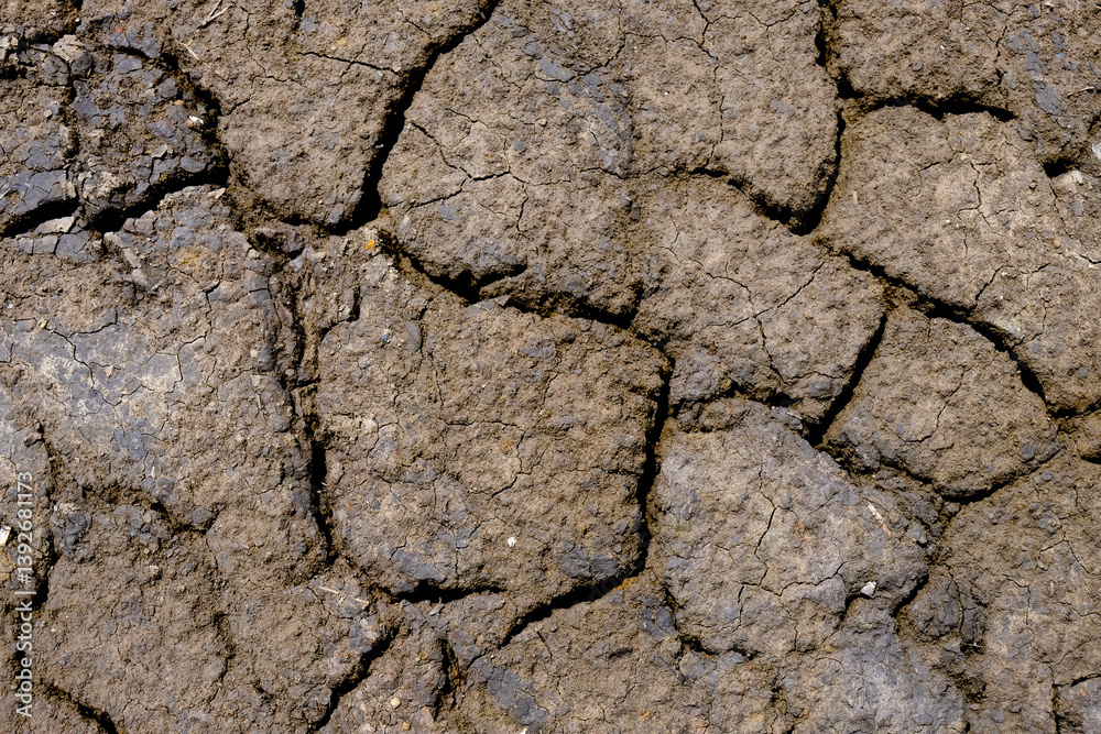 Wall texture soil dry crack pattern of drought lack of water of nature brown old broken background. Wall texture soil dry crack pattern of drought lack of water of nature brown old broken background.