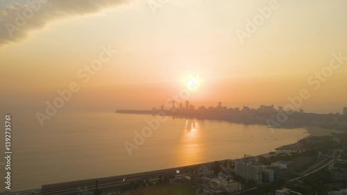 Beautiful sunset with dramatic clouds at Marinedrive, Mumbai