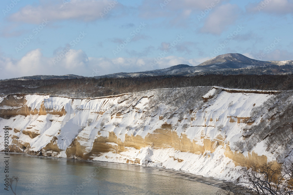 Golovninskiy cliff on the island of Kunashir on a winter day