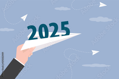 Paper plane with 2025 text inside. New opportunities, goals and expectations. Starting new year. Business theme, flight and travelling. Businessman hand launch paper plane.
