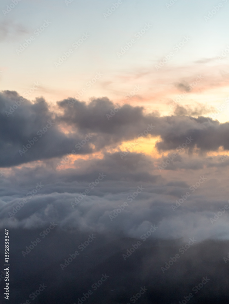 Fototapeta premium Misty Mountain Landscape at Dawn with Silhouetted Trees