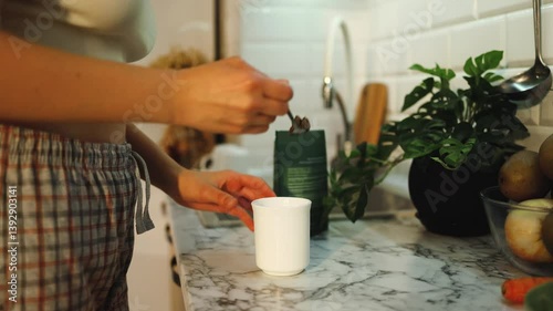 Healthy, beautiful girl woman, stirs dietary supplements, powder, medicine for health in a mug, pouring water into a glass from a bottle, nutrients, vitamins, nutrition, drink, power, energy, care