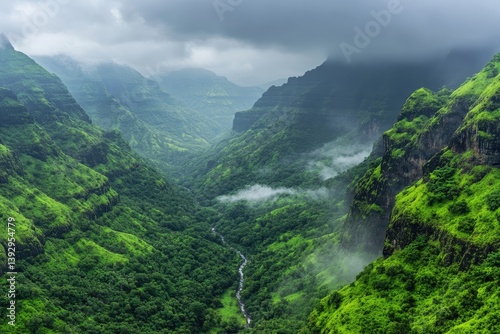 Lush valley nestled amongst dramatic mountains photo
