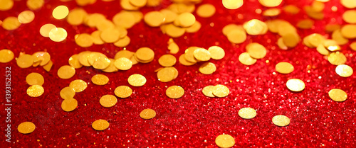 Festive golden glitter confetti on a deep red background. Perfect for holiday invitations, party decorations or any holiday project.