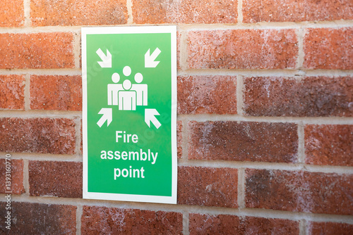 Fire assembly point. Safe area outside a building where people should gather after evacuating in the event of a fire.