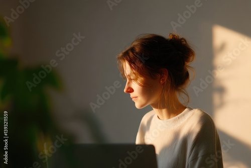 serene home office scene featuring focused individual working at desk surrounded by greenery sunlight streaming through