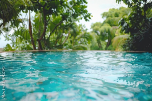Relaxing in a tranquil pool surrounded by lush greenery during a summer day in a tropical paradise