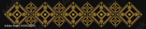 Ukrainian pattern. Ukrainian embroidery. Yellow patterns on a dark background. Wide background stripe