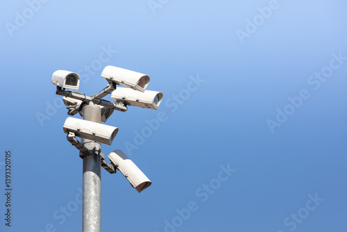 Six security cameras on pole. Video surveillance. CCTV cameras.