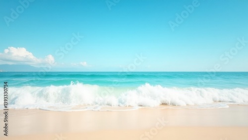 Wide panoramic view of soft ocean waves washing onto the sandy shore, under a clear blue sky. A tranquil and refreshing tropical seascape perfect for travel concepts.