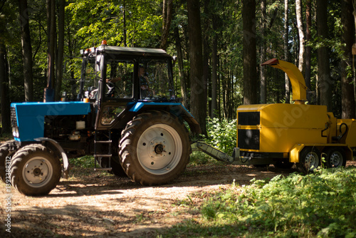 Obraz na płótnie Wood processing machine. Diesel powered stick cutting equipment. w salonie