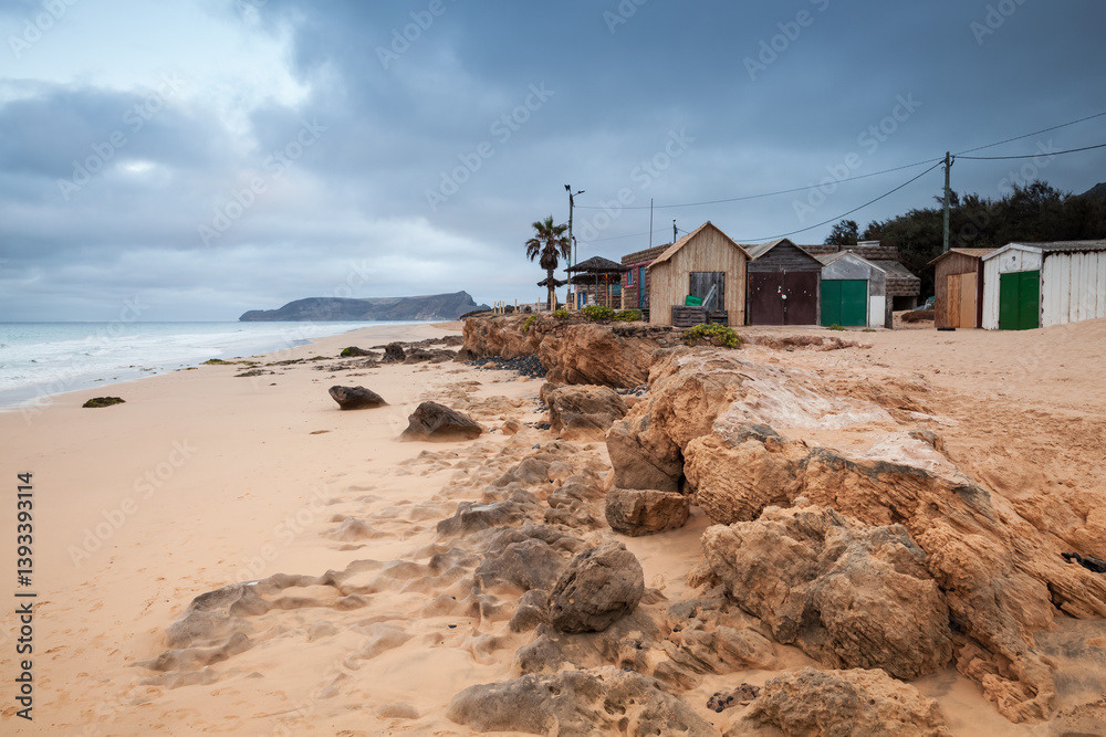 Tranquil coastal scene featuring a sandy beach, Porto Santo, Portugal