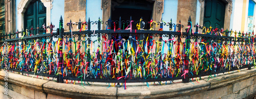 Colorful Bonfim wish ribbons tied around at Church of Nosso Senhor do Bonfim, Pelourinho, Salvador, Bahia, Brazil.
