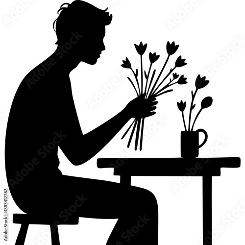 Man arranging flowers in vase at table in silhouette style
