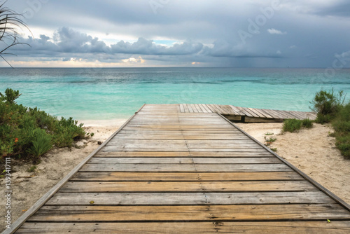 tropical beach with wooden pier