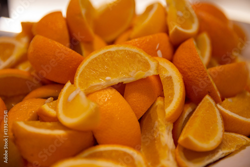 Canvas Print Pile of Sliced Oranges