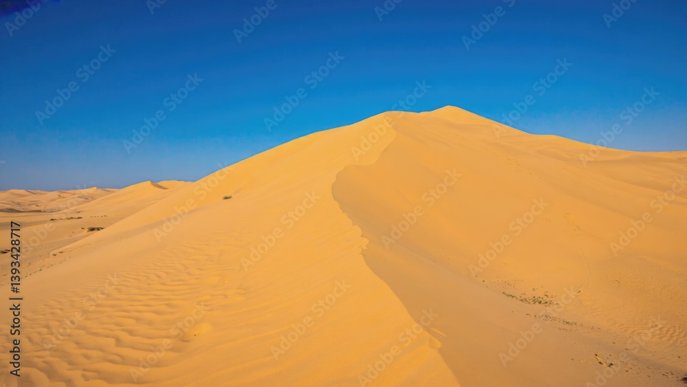 A large sand dune in a desert landscape, perfect for travel or adventure themes