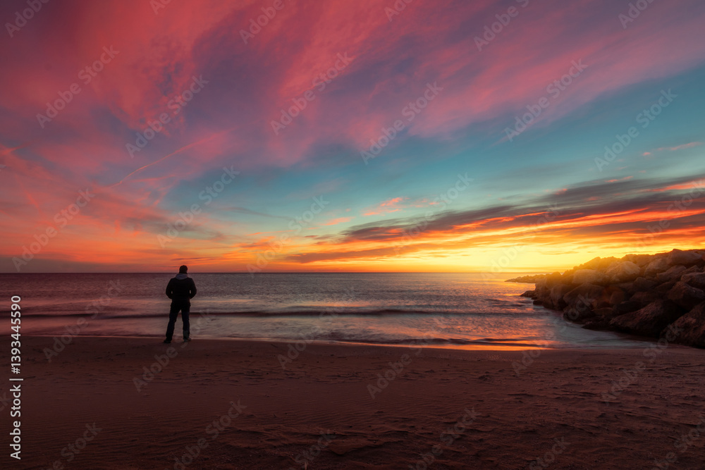 dramatic coastal landscape with colorful dramatic sky with person dramatic coastal landscape with colorful dramatic sky with person