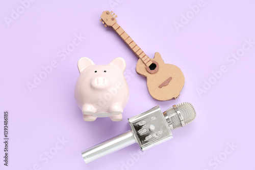 Piggy bank with toy guitar ...