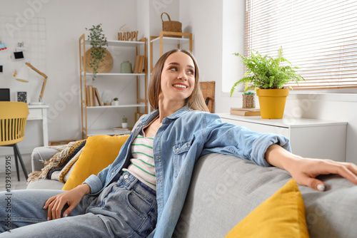 Smiling young woman relaxin...