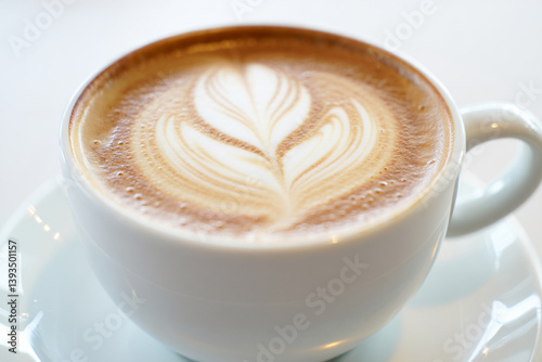 Perfectly Poured Cappuccino Isolated on Bright White Background