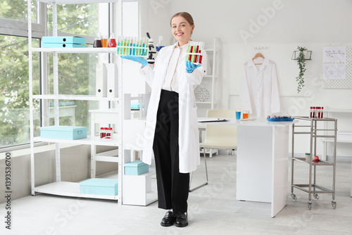 Female chemist with test tu...