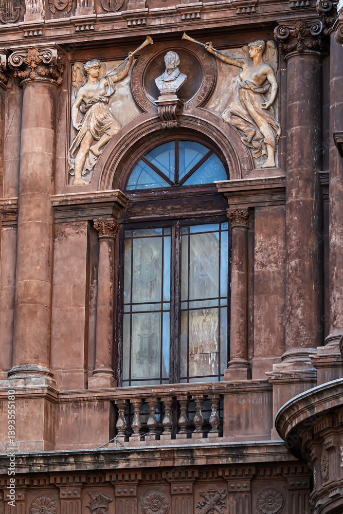 Architectural details of the Massimo Bellini Theater (Teatro Massimo Bellini, 1890). Catania, Sicily, Italy.