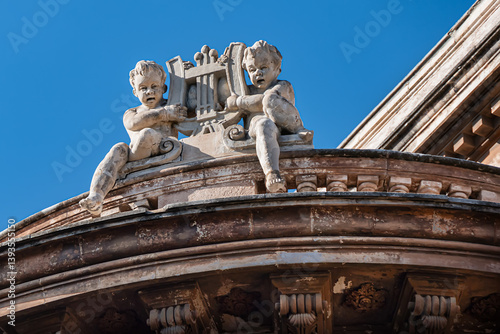 Architectural details of the Massimo Bellini Theater (Teatro Massimo Bellini, 1890). Catania, Sicily, Italy.
