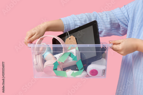 Woman holding electronic wa...