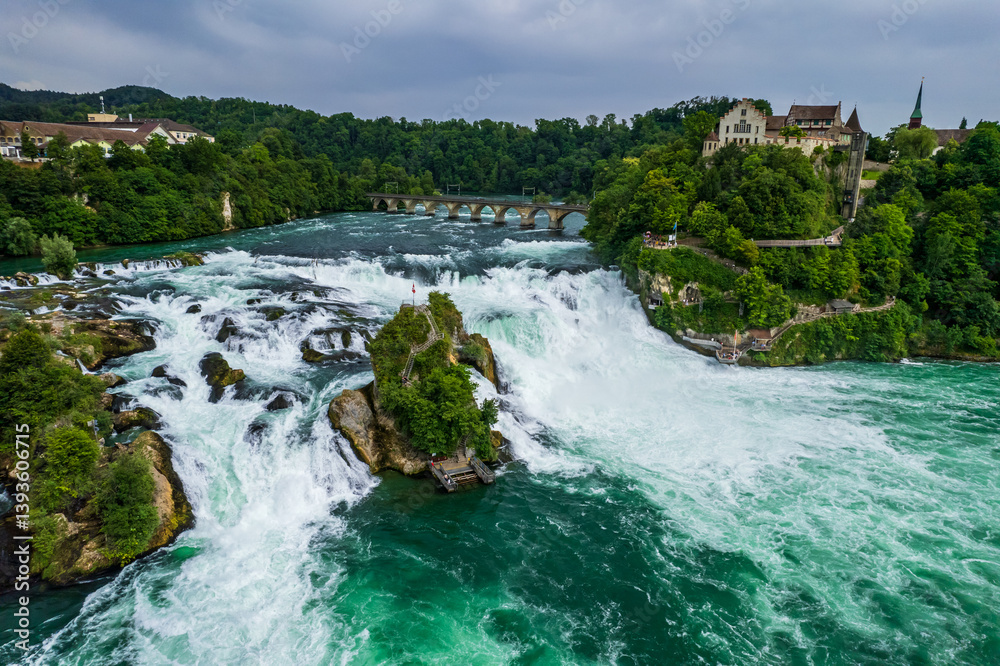 Fototapeta premium Aerial view of famous Rheinfall and colorful touristic boats in Switzerland