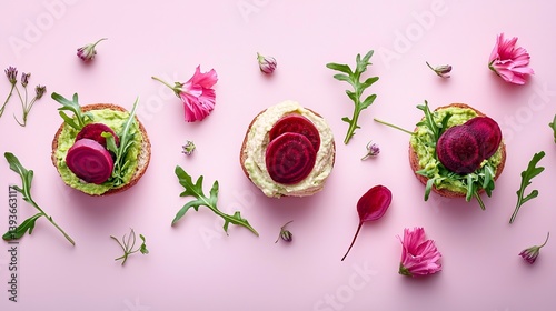 Obraz na płótnie Minimalist composition of vegan sandwiches, beetroot hummus spread inside, with arugula, sliced beets, and creamy avocado, soft lighting w salonie