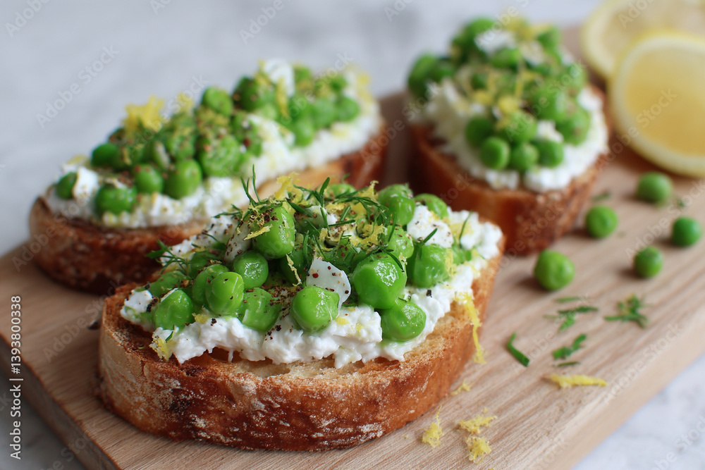 Broad bean and ricotta toast with lemon zest Broad bean and ricotta toast with lemon zest