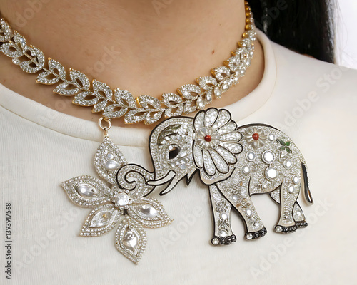 silver necklace on white background, Design for Illustration of collar neck decoration with rhinestones in the form of a necklace, rhinestone elephant