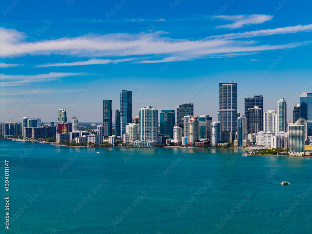 Fototapeta premium Panorama of Miami. Aerial view of modern skyscraper in downtown Miami, Brickell Key. Skyline of Miami. Brickell city center. Modern city building and skyscraper. City downtown skyline
