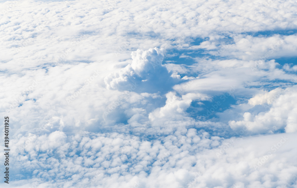 Blue sky with clouds in the sky. Beautiful blue sky background with clouds.Natural and cloudy fresh blue sky background. White fluffy clouds in the blue sky. Blue sky with clouds in the sky. Beautiful blue sky background with clouds.Natural and cloudy fresh blue sky background. White fluffy clouds in the blue sky.