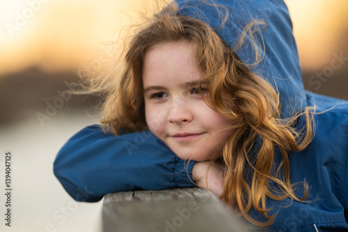 Фотография Dreamy child enjoying fresh air