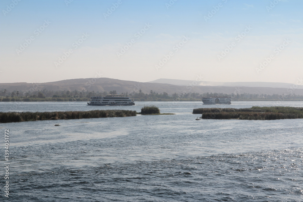 Nile Cruises in the magical blue Nile River in upper Egypt Nile Cruises in the magical blue Nile River in upper Egypt
