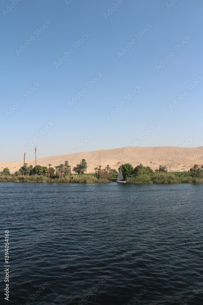Fototapeta premium Landscape of the magical blue Nile River in upper Egypt