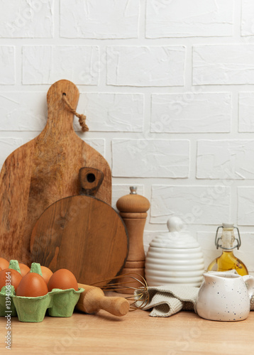 Obraz na płótnie Kitchen utensils and food ingredients creating cozy culinary scene on wooden table w salonie