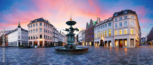 Photography Stork Fountain on the Amagertorv (Amager Square) and the longest pedestrian street in the world Stroget in Copenhagen Denmark