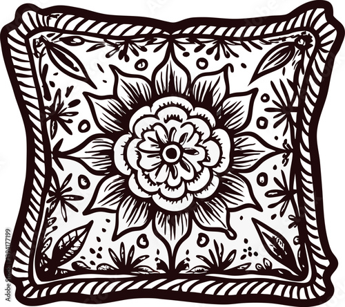Decorative cushion with intricate floral mandala pattern and leaf details.