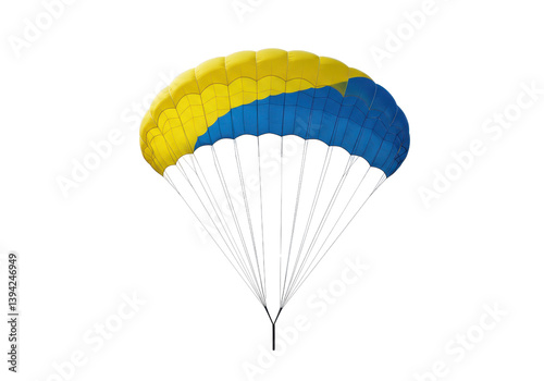 Colorful parachute descending against a clear sky, symbolizing adventure and freedom
