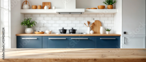 Wooden kitchen table in modern interior as a blurred background behind the bokeh golden sunshinsunshin